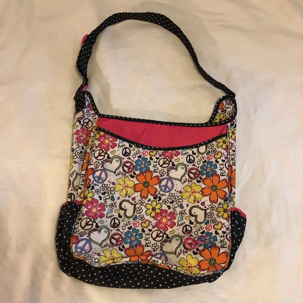 Justice flower Peace bag with adjustable strap.‎